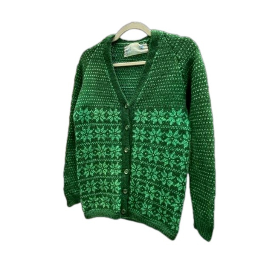 Vintage hand knit cardigan. Six buttons in front. Women’s size medium.